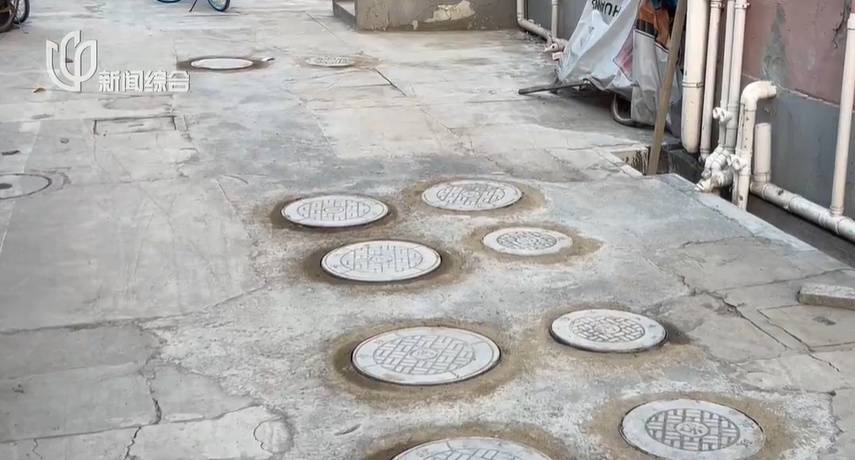 太夸张！上海人比比谁家楼下井盖多！有人家门口100个<strong></p>
<p>炒币神器</strong>，“走路难！到处都像贴膏药”...